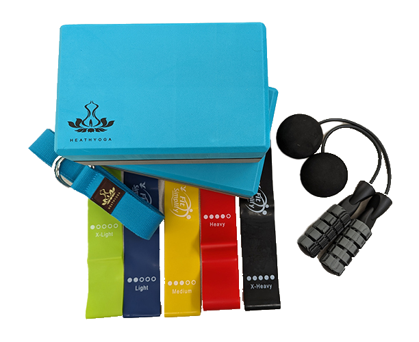 A photo of two foam blocks, five rubber resistance bands, and a pair of jump rope handles.