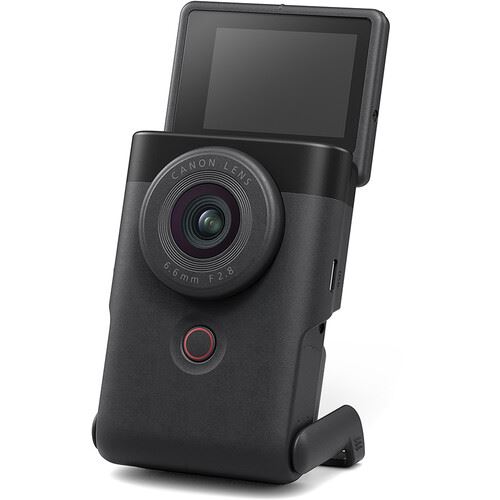 A photo of a hand sized device with a camera lens on its front and display screen on its back.